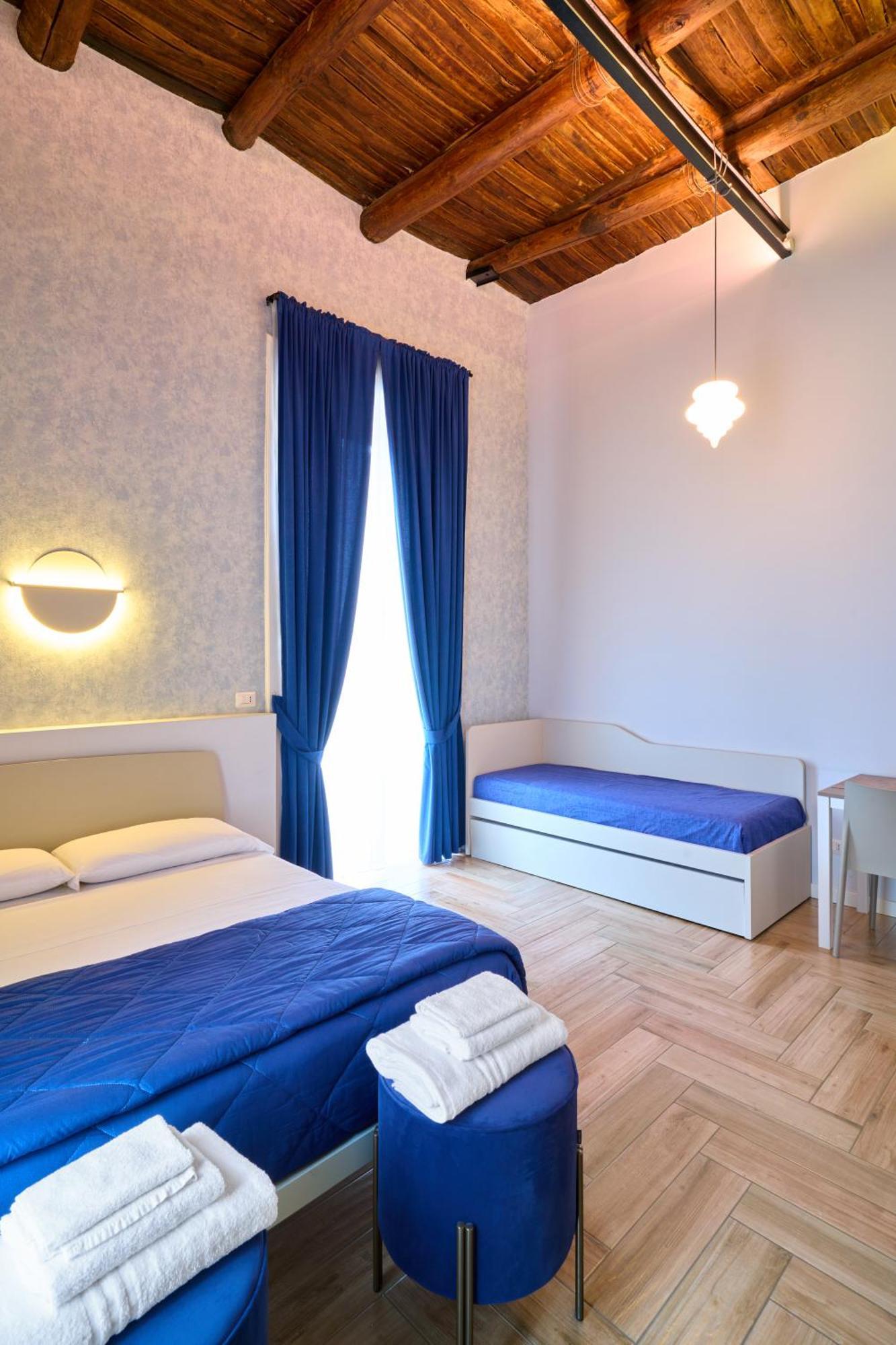 Chambre Quadruple avec Balcon